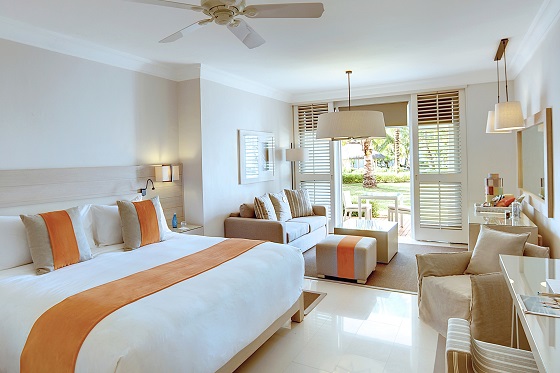 Orange touches give the Junior Suite a warm feel.