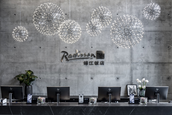 Example of how signage will reflect the Radisson-Jin Jiang co-brand