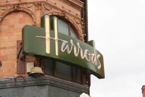 Harrods logo on the facade of its iconic London store. Photo by Mario Sánchez Prada/CC