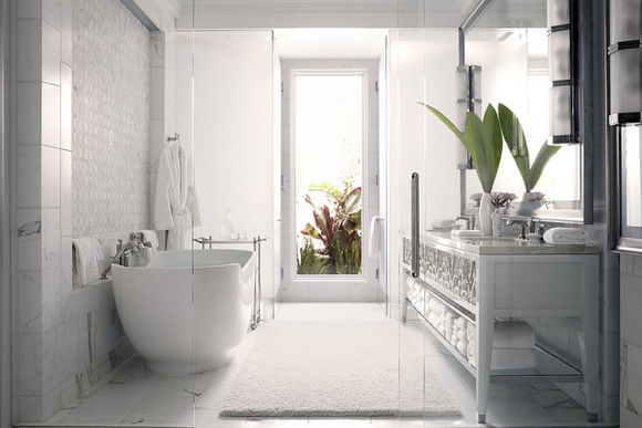 Bathrooms offer free-standing tubs, steam showers and vanities.