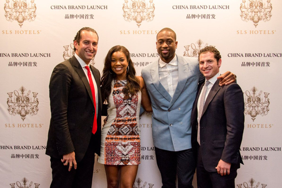 From left, Sam Bakhshandehpour, sbe president, Gabrielle Union, Dwayne Wade and Michael Talansky, director of operations for sbe Hotel Group at the signing ceremony with Palace Hospitality in Shanghai.