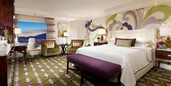 A Resort King Room in the green tea-and-plum palette.