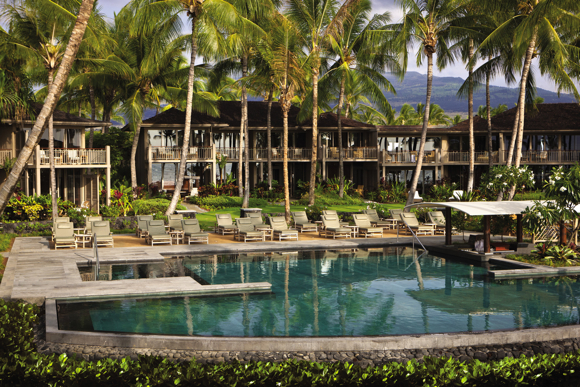 The six-week closure of Four Seasons Resort Hualalai allowed the property to construct the new Palm Grove Pool, an adults-only venue with a swim-up bar and bench seating within the pool. Photo used courtesy of Four Seasons Resort Hualalai.