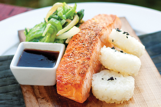 Sunrise Springs uses a farm-to-table approach to its food. Pictured above: cedar-planked salmon with sticky rice cakes and sautéed bok choy. 