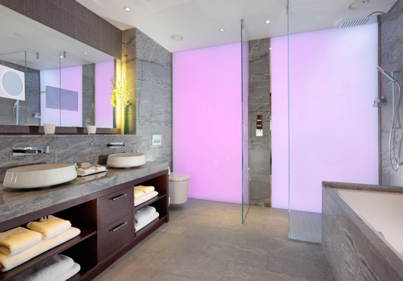 The suite's bathrooms feature top-end adaptable mood lighting, marble floored walk-in showers and oversized baths.