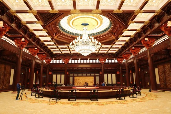 The one-piece carpet in Jixian Hall, where the AELM was held, spans 1,000 square meters (10,764 square feet), was handmade by more than 100 workers and took four months to complete.
