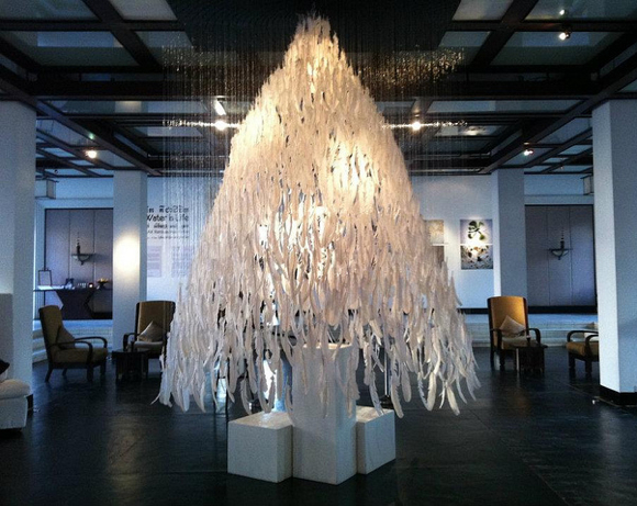 The Christmas tree at Hôtel de la Paix in Siem Reap, Cambodia, made from 3,000 white feathers hung on individual wires from the ceiling in the hotel’s lobby.