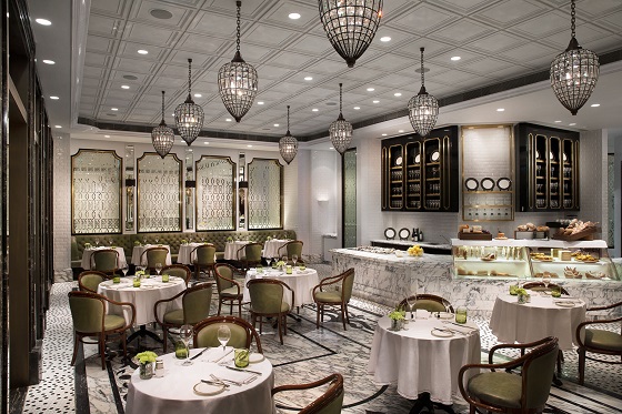 Dainty lighting adds an elegant touch to the cafe at the Ritz-Carlton.