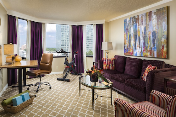The White Lotus Suite features a stand-up desk and spin bike.