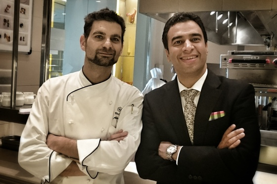Varun Chhibber (right), general manager of The Oberoi, poses with Adriano Baldassarre, chef in the hotel's Vetro Italian restaurant.