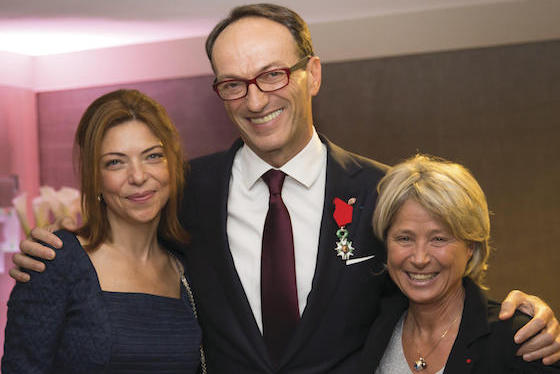 Leboeuf at a ceremony awarding him France's Legion of Honor in 2014. A Chacun Son Everest's Christine Janin decorated him with his insignia: She is pictured (right) with Leboeuf and his partner, Pepita Diamond.
