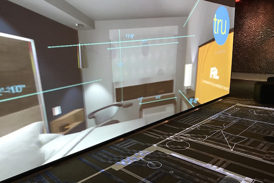 Hilton's Innovation Gallery at its Virginia headquarters features a VR area where 3-D projections of guest room prototypes can be experienced. 