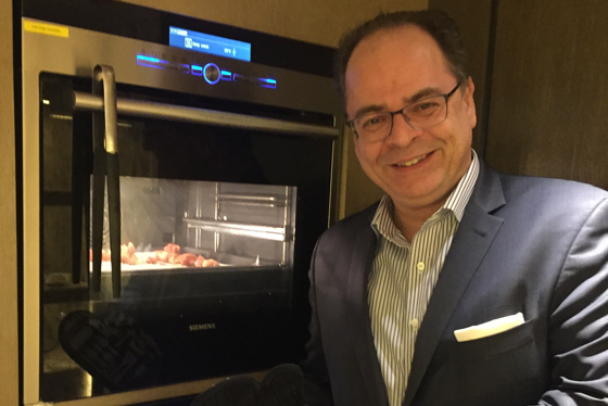 Thomas Hoeborn shows off an oven in one of his lounges