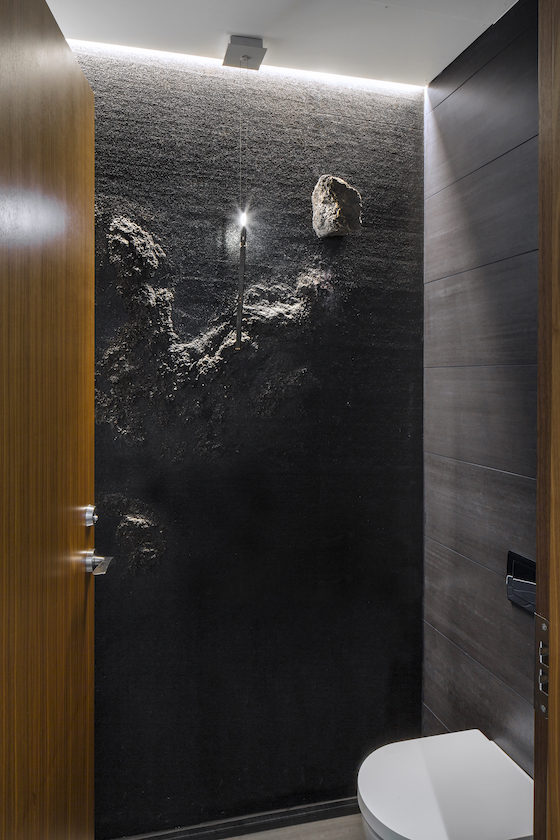 The bathroom at the Ion City Hotel in Reykavik uses black volcanic sand.