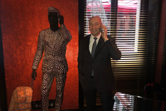 Gérald Van Reck (r.) with one of the hotel’s artworks, Man with Suitcase Trolley. It is composed of stainless steel discs and mixed media, by Indian artist Valay Shende.
