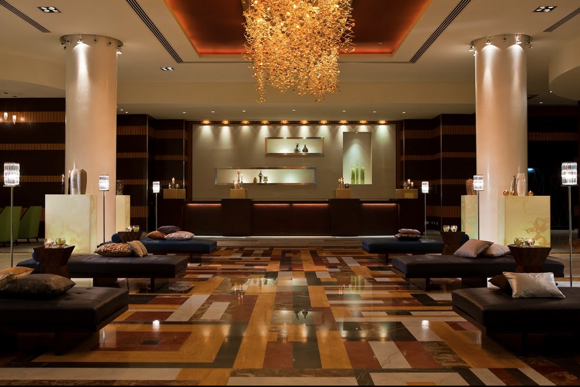 The Renaissance Doha City Center Hotel (lobby pictured here) incorporates a local touch via artwork featuring Qatar architecture and images from Sheikh Faisal Bin Qassim Al Thani’s collection of cultural and historical art. Images used courtesy of Marriott International.