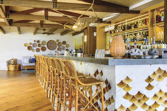 The restaurant at Ko Olina uses local touches including native wood.
