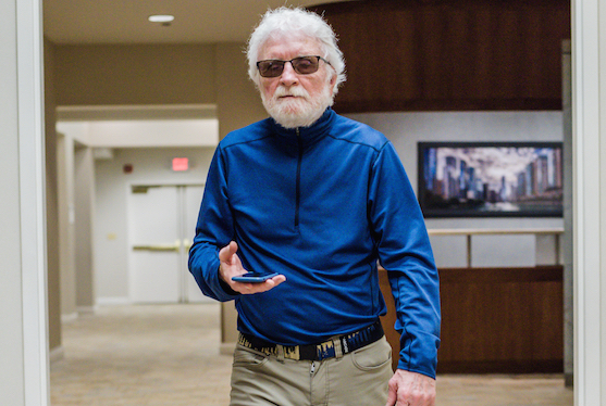 Paul E. Ponchillia, who is blind, uses the Loud Steps app to navigate the DoubleTree by Hilton Hotel Chicago. Ponchilli, who helped develop the app, is professor emeritus and former chair of the Department of Blindness and Low Vision Studies at Western Michigan University.