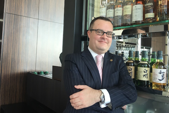 Neil McInnes shows off some Scottish and Japanese whiskies in the 28th-floor lobby bar at Conrad Tokyo.