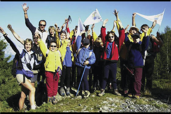 Leboeuf (back, far left) with children from the charity he's worked with since 1997: A Chacun Son Everest.