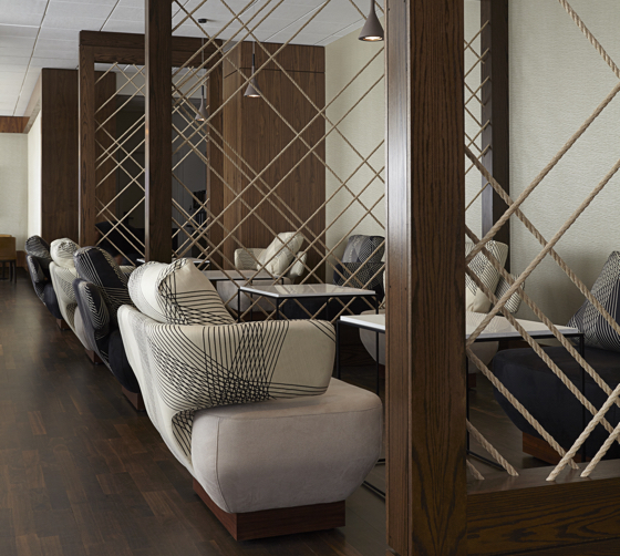 The M Club Lounge uses wood, rope and knots reflective of the nearby Brooklyn Navy Yard.