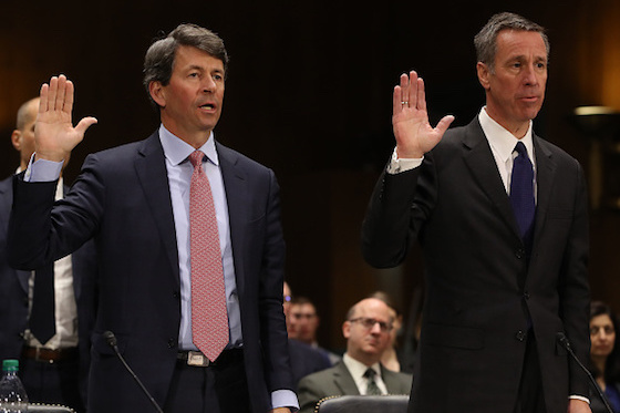 Mark Begor, CEO of Equifax (Left) and Arne Sorenson, CEO of Marriott International are sworn in during a U.S. Senate Homeland Security and Governmental Affairs Committee hearing on Capitol Hill, March 7 in Washington, DC. The committee heard testimony on investigations examining private sector data breaches. (Mark Wilson | Getty Images)