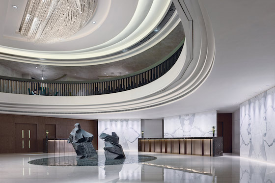 The lobby features artwork by contemporary artist Ju Ming. 