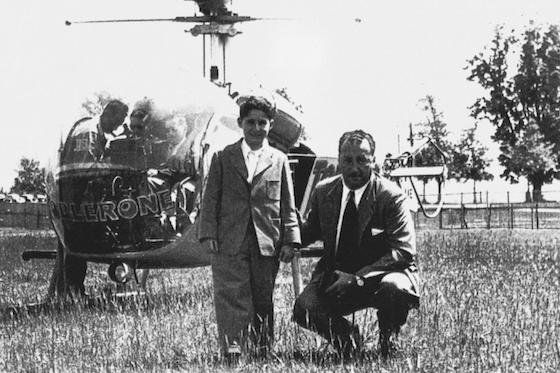 Michael Kadoorie, at age 12, about to embark on his first helicopter flight, on a weekend out from boarding school in Bern, Switzerland. With him is Leo Gaddi, the legendary former GM of the Peninsula Hong Kong.