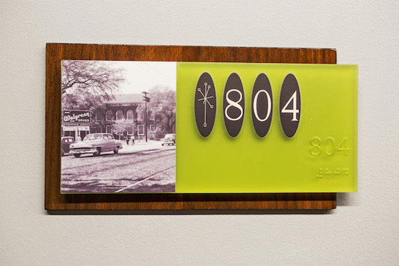 Guest room numbers with historic photos