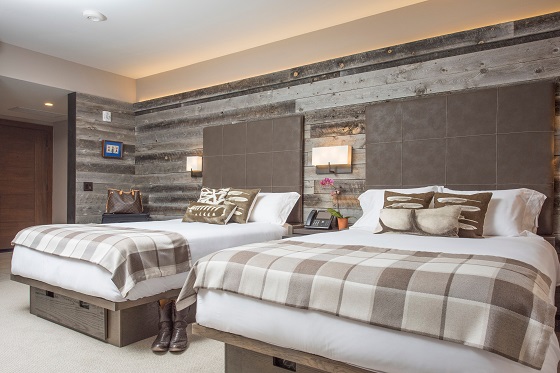 Cool tones add an urban edge to a guestroom.