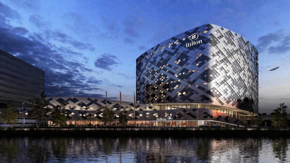 An artistic rendering of the exterior of the new Hilton planned for Schiphol airport.