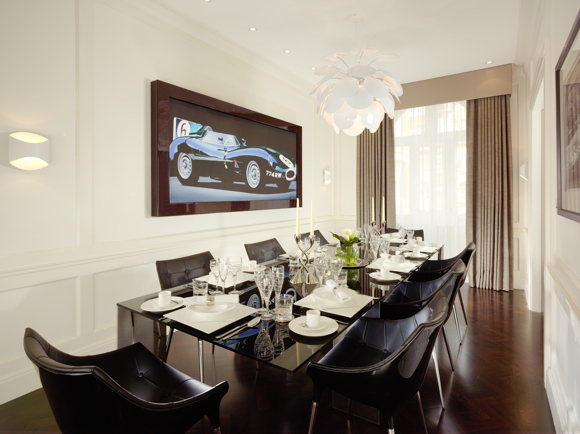 The chic dining room doubles up as a meeting space.