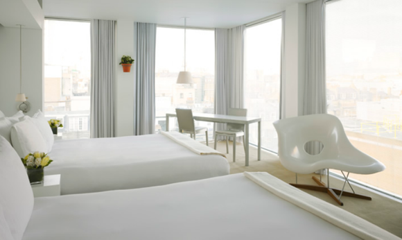 The loft double guestroom at St. Martins Lane features Philippe Starck-designed furniture. Photo used courtesy of Morgans Hotel Group