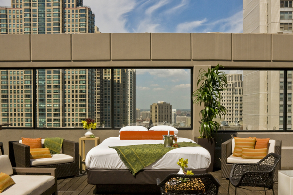 A king-size bed on Affinia's rooftop. Photo used courtesy of Affinia Chicago